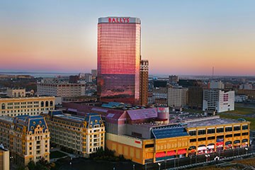 Aerial view of Bally's Atlantic City at sunset.