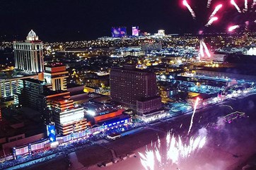Tropicana Atlantic City Fireworks show over the beach and boardwalk at night.