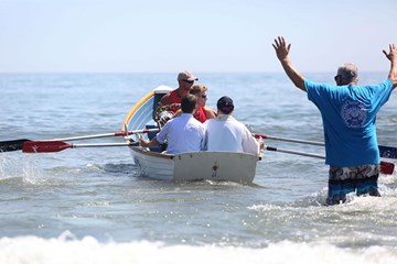 Atlantic City Lifeguards row clergy out to sea during the Blessing of the Sea Ceremony in Atlantic City.